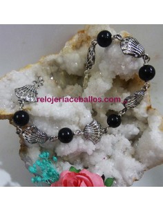 Pulsera de conchas con bolas de Azabache