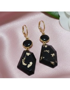 Aretes con carbón...